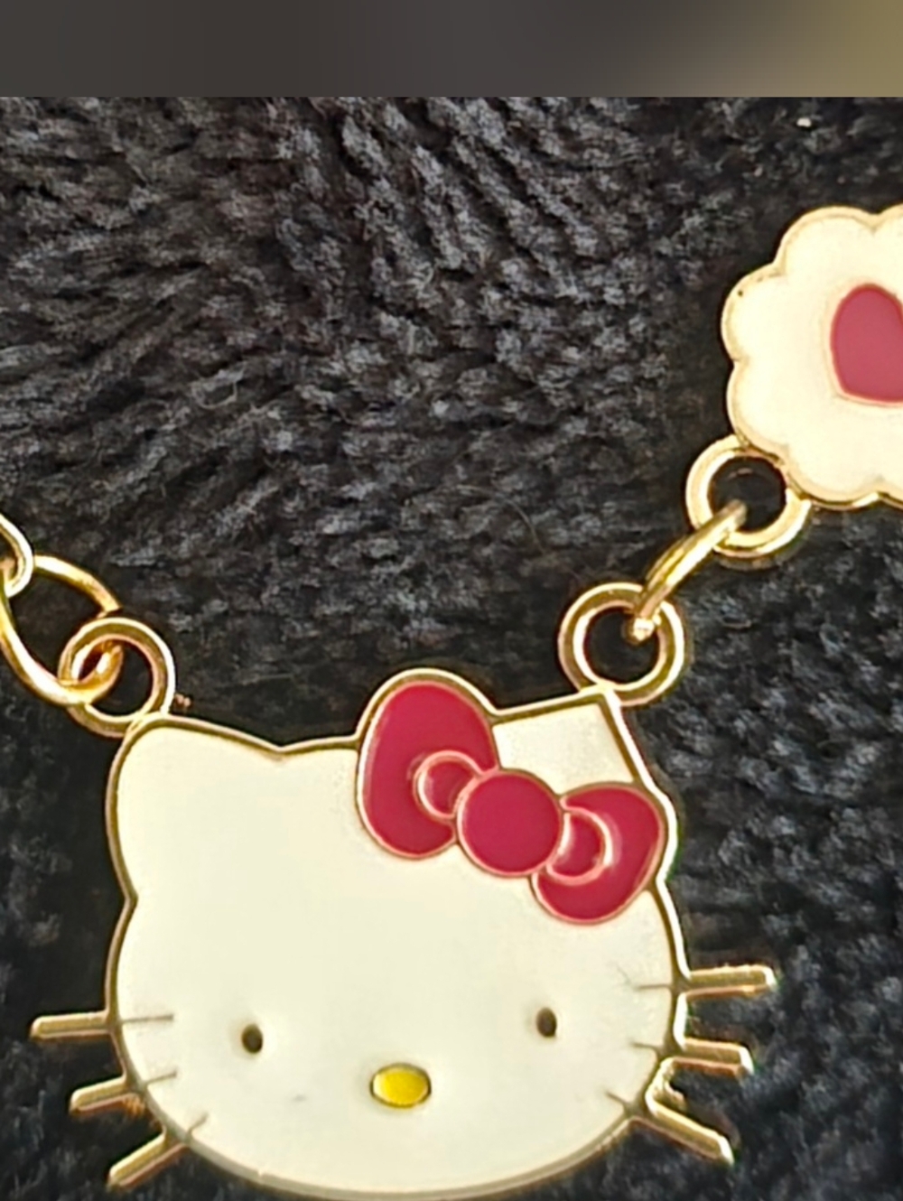 Sanrio Gold-Tone Hello Kitty Pendant Necklace with White Enamel & Red Bow - Picture 2 of 2